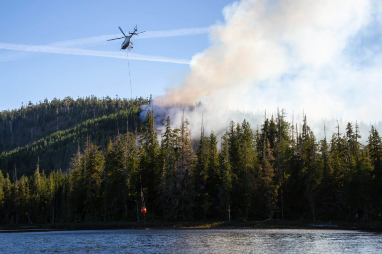 helicopter fighting bc forest fires during a hot s 2022 04 06 05 44 14 utc